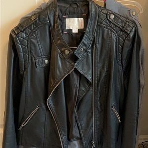 Short, leather looking black jacket